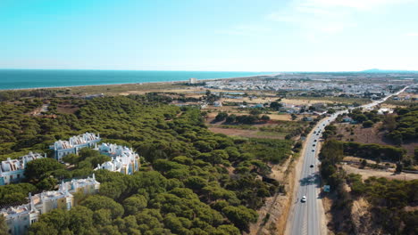 Panoramic-View-Over-Praia-Verde-With-Altura-Town-In-Background-In-Portugal---aerial-pullback