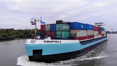 Aerial-Across-Forward-Bow-Of-Tripoli-Cargo-Ship-Along-Oude-Maas