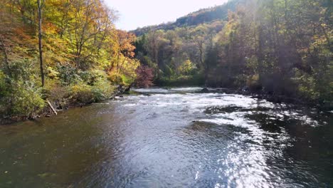 low-fast-aerial-push-into-the-new-river-in-watauga-county-nc,-north-carolina-near-boone