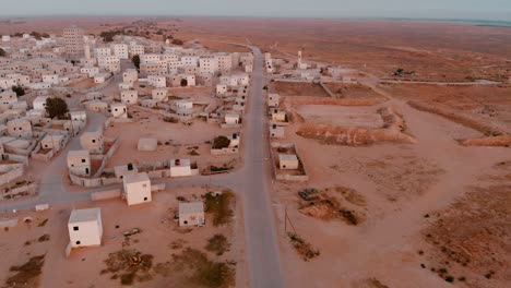 aerial-shot-of-empty-road-in-an-old-empty-city-in-the-desert-in-palestine-near-Gaza