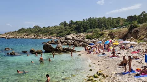 Cala-Mazzo-di-Sciacca-rocky-beach-tourist-destination-near-Scopello,-Sicily-in-Italy