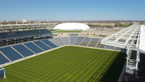 Aerial-Pullback-Reveals-SeatGeek-Soccer-Stadium-in-Chicago,-Illinois-on-Beautiful-Day