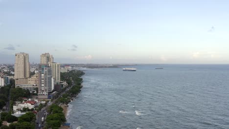 Aerial-drone-panoramic-view-of-Malecon-waterfront-coast-in-Santo-Domingo
