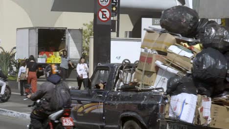 Pickup-truck-loaded-with-materials-for-recycling,-Sao-Paulo,-Brazil