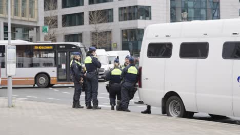 Belgian-police-controlling-road-traffic-to-prevent-freedom-convoys-entering-the-city-center-of-Brussels,-Belgium-to-block-major-roads