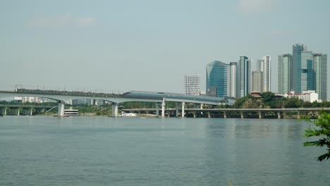 Seoul-Subway-Line-Two-Railway-Train-Moving-Along-Dangsan-Railroad-Bridge-or-Iron-Bridge-over-Han-river-in-Hapjeong,-Seoul-static-daytime-copy-space