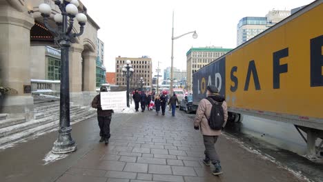 POV-Walking-Along-Street-Past-Peaceful-Protest-For-Freedom-Convoy-In-Ottawa-On-January-28-2022