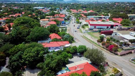 Tilt-up-aerial-view-of-the-residential-neighborhood-of-Mahaai-Buurt,-Willemstad,-Curacao,-Dutch-Caribbean-island