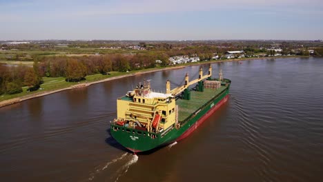 Aerial-View-From-Stern-of-Aal-Paris-Cargo-Ship-Travelling-Along-Oude-Maas