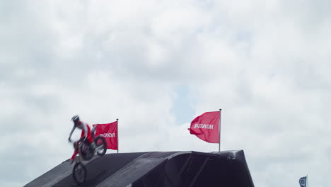 The-Royal-Cornwall-Show-2022-with-the-Bolddog-Freestyle-Riders-Jumping-in-the-Air-Over-a-Ramp