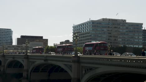Early-morning-rush-hour-traffic-backed-up-over-the-Westminster-bridge-with-St-Thomas-Hospital-building-in-the-background,-London,-England