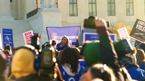 Woman-speaking-to-a-crowd-outside-the-Supreme-Court