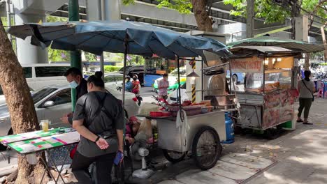 Small-business-street-food-stall-,-streets-of-Bangkok