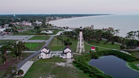 Aerial-view-of-Cape-San-Blas-lighthouse,-keeper's-house-and-St