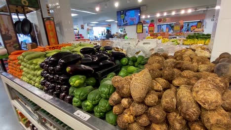 static-shot-of-the-full-fruit-and-vegetable-racks-with-delicious-fresh-products-waiting-for-the-customer-in-the-store