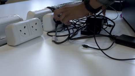 Unplugging-Electronic-Devices-from-Electricity-Socket,-Power-Saving-Concept