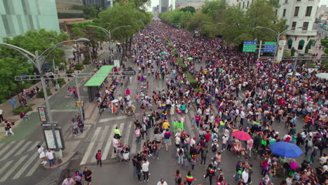 Aerial-Flying-Over-Large-Crowds-Gathered-Along-Paseo-De-La-Reforma-On-25-June-2022