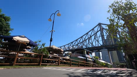 Low-shot-of-Story-Bridge-with-outdoor-dining-and-hospitality-in-Howard-Smith-Wharves