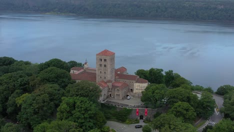 Slight-raising-aerial-orbit-over-The-Cloisters-museum-in-Upper-Manhattan-NYC-on-the-bank-of-the-Hudson-River