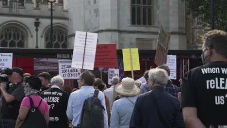 People-Holding-Up-Placards-At-Leaseholders-Together-Rally-In-Parliament-Square