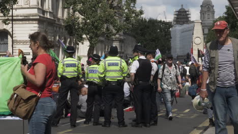 Group-Of-Metropolitan-Police-Standing-At-Whitehall-During-XR-Protest