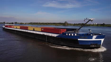 Cargo-Vessel-Of-Borelli-Sailing-On-Oude-Maas-River-Loaded-With-Container-Goods-In-Barenrecht,-Netherlands