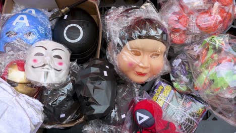 Halloween-theme-costumes-inspired-on-Netflix-phenomenon-TV-show-Squid-Game-masks-are-seen-for-sale-at-a-stall-days-before-Halloween-in-Hong-Kong