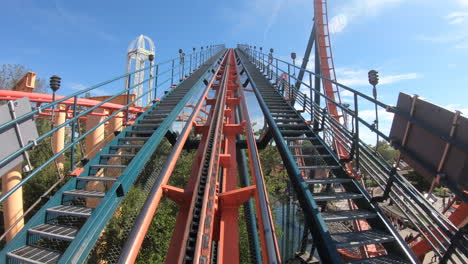 Roller-coaster-rides-up-incline-on-track-in-Cedar-Point-Amusement-Park