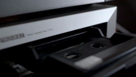 Close-Up-Of-Pioneer-T-C3-Stereo-Cassette-Deck-Sliding-Out-And-Tape-Being-Inserted-Into-Tray
