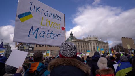 Ukrainian-lives-are-matter-is-written-on-sign-at-anti-war-demo-in-Munich-after-Russia-invaded-Ukraine