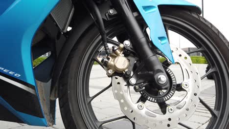 Kuala-Lumpur,-March-12,-2022---a-stunning-display-of-the-Honda-RS_X-150-motorcycle-in-a-bright-blue-color