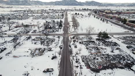 Drone-Aerial-View-of-Street-with-Burnt-Down-Neighborhood-Residential-Area-Buildings-in-Superior-Colorado-Boulder-County-USA-After-Marshall-Fire-Wildfire-Disaster