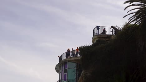 People-looking-out-from-Balcony-of-Europe-in-Nerja,-Spain