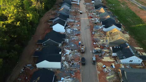 Aerial-flyover-of-a-construction-site-with-unfinished-houses