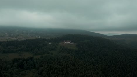 Aerial-shot-of-mountains-hotel-in-misty-mountains