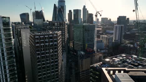 Establishing-Aerial-drone-View-of-Gherkin-skyscraper-with-London-Skyline,-20-Fenchurch-or-Walkie-Talkie,-sky-garden-by-the-Thames-River,-United-Kingdom,-Europe