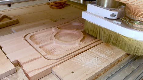 CNC-router-machine-cutting-on-the-wooden-board