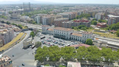 Aerial-Orbiting-Shot-Above-Rome's-Trastevere-Train-Station-in-Italy-on-Beautiful-Summer-Afternoon