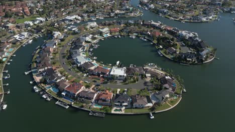 Epic-aerial-of-C-shape-James-Cook-Island-luxury-residential-properties