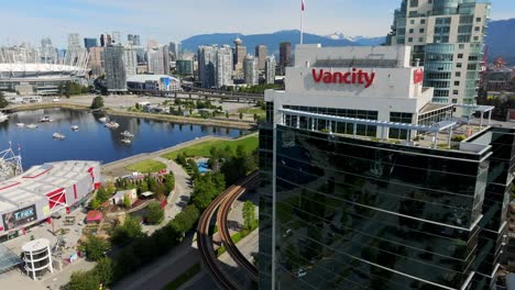 Towering-Residential-And-Financial-Buildings-In-Vancouver-With-Sight-Of-Urban-Dock-And-BC-Place-Stadium-In-The-Narrow-End-Of-False-Creek,-British-Columbia,-Canada