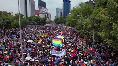 Drone-flying-low-over-a-huge-crowd-taking-a-stand-for-Gay-Pride-In-Mexico-City