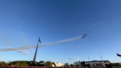 Fighter-jets-fly-in-formation-trailing-smoke-over-the-Palacio-do-Planalto