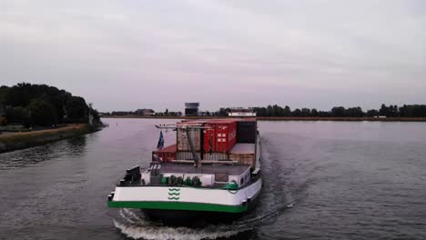 Planned-Shot-Of-Alfa-Verde-Cargo-Ship-Loaded-With-Containers-Speeding-To-Dordrecht-Port,-South-Holland-Province