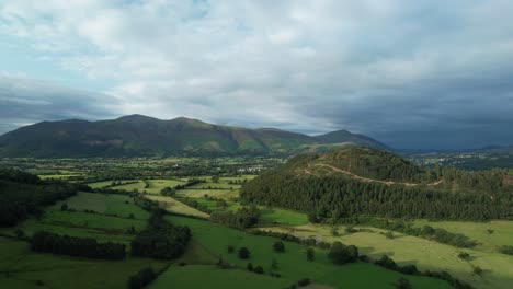Aerial-view-from-the-Newlands-Valley-to-Skiddaw-and-Blencathra,-Cumbria,-UK