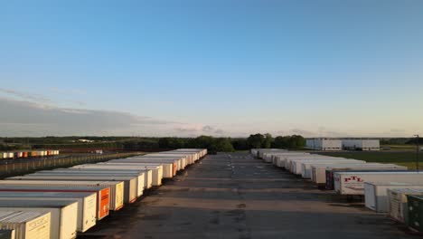 Flying-through-a-storage-yard-of-moving-trailers