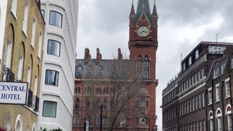 Tilt-up-shot-of-the-St-Pancras-Station-clock-tower
