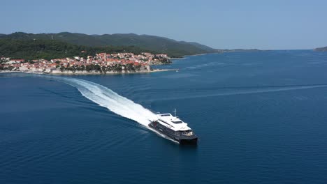 Catamaran-Watercraft-Sailing-At-Adriatic-Sea-With-Korcula-Town-In-Background-At-Croatian-Island