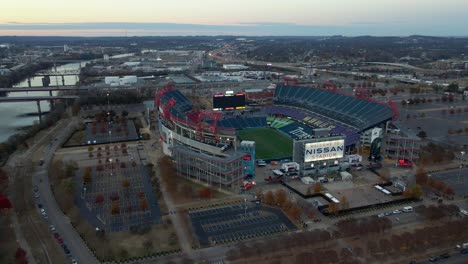 Aerial-view-of-the-Nissan-Stadium,-fall-dusk-in-Nashville,-USA---tilt,-drone-shot