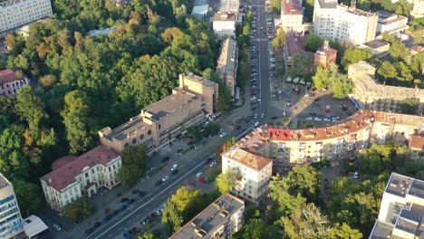 Aerial-drone-video-of-downtown-buildings-and-cars-on-the-road-in-Pecherskyi-district-of-Kyiv-Oblast-Ukraine-during-sunset