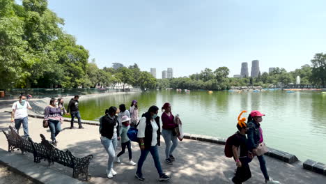 children-walking-in-the-polluted-lake-of-chapultepec-in-mexico-city